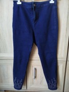 Granatowe damskie spodnie jeansowe o fasonie typu skinny lub slim L