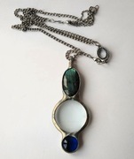 Artystycznie oprawiona lupa naszyjnik z kamieniami