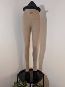 Beżowe legginsy prążkowane Lapia Fashion