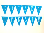 Girlanda, baner z napisem "Roczek Maksia"