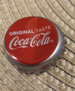 Kapsel Coca-Cola butelkowane