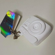 Breloczek aparat z wysuwanym zdjęciem