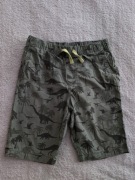 Zielone khaki bawełniane krótkie spodenki szorty w dinozaury H&M 140