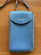 Mała niebieska torebka na telefon pieniądze