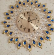 Zegar pawie piórka płynący Glamour 