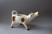 Porcelanowa krowa mlecznik