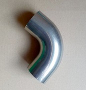 Kolanko 90° ze stali nierdzewnej w rozmiarze ok 50mm. Spawanie wydechu.