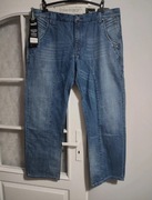 Nowe spodnie jeansowe vintage Damaged model Phantom 40/32