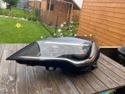Reflektor Lewy Opel Astra K  796 03 000 05
