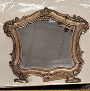 Stare lustro w oprawie barokowej.