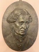 Glowa kobiety plaskorzezba