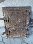 Stare żeliwne drzwiczki Rzucow