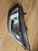 Hyundai i20 921011j510 reflektor lewy