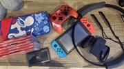 Nintendo Switch v2 + pad + ring + kartaSD + 6 gier + etui