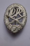 DDR FDJ odznaka wojskowa w kolorze srebrnym.Za doskonałe strzelanie.NRD