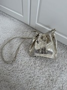 Złota torebka mały worek woreczek Kazar skorzana skóra naturalna