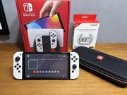 Nintendo Switch OLED 64GB – jak nowy, futerał + 2 kierownice