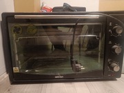 Piekarnik Optimum z rożnem, wolnostojący, jak nowy.