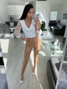 Spodnie eco skóra roz. L By Mielczarkowski