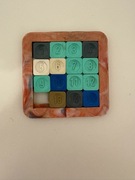 Układanka logiczna z okresu PRL, pochodząca z lat 70. XX wieku.