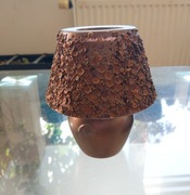 Świecznik złota lampka z cekinami.