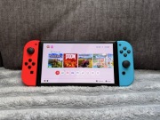 Nintendo Switch OLED + 4 gry + etui | Zadbany komplet