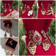 Komplet ze srebra pozłacanego zdobiony rubinowo czerwonym kamieniem  