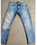 Męskie jeansy Reserved W30 L32 –stylowy fason z suwakami przy nogawkach