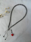 Naszyjnik hematyt, serce ceramiczne, stal