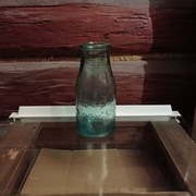 Stara butelka po śmietanie