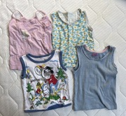 Cztery sztuki koszulek bezrękawników dla dziewczynki rozmiar 92