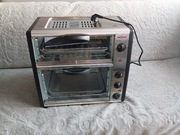 Piekarnik podwójny .z obrotowym rożnem oraz górna powierzchnia do grilla .