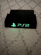 Stojak podstawka na gry Ps2 Ps3 Ps4 Ps5 napis fluorescencyjny