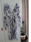 sukienka w kwiaty z metką .