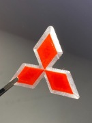 Znaczek emblemat Mitsubishi Colt CJ zamiennik MR300033
