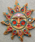 Indyjskie,ceramiczne słońce.