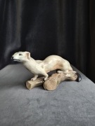 Figurka Dahl Jensen Gronostaj na kłodzie 