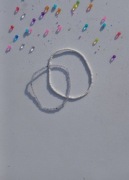 Bransoletka przezroczysta i biała na gumce