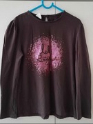 Dziewczęca bluzka na długi rękaw.