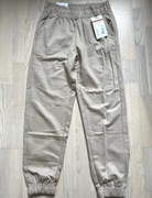 Spodnie dresowe jasne nowe beżowe dresy S z metkami Sinsay