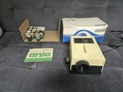 Rzutnik projektor ANIA PRL B-9 + 18 bajek (klisze) + pudełko + instrukcja