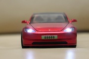 Model samochodu jak Tesla Model 3 1:32 światło dźwięk 