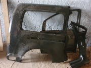 Błotnik tylny prawy VW Caddy 2K0