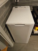 Pralka Candy ładowana z góry od góry wąska