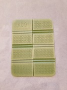 Nowa mata turystyczna do siadania składana zielona