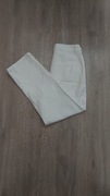 Białe spodnie jeansy 