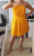 Słoneczna żółta pomarańczowa sukienka tulipan