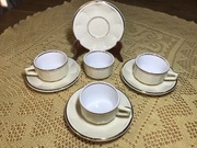 Zestaw 4 filiżanek ze spodkami porcelana  z złotą obwódką DELAUNAY FRANCE