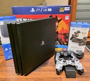 PlayStation 4 Pro 1TB + 2 pady + ładowarka Energizer + vertical stand