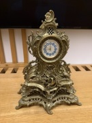 Mosiężny zabytkowy zegar kominkowy